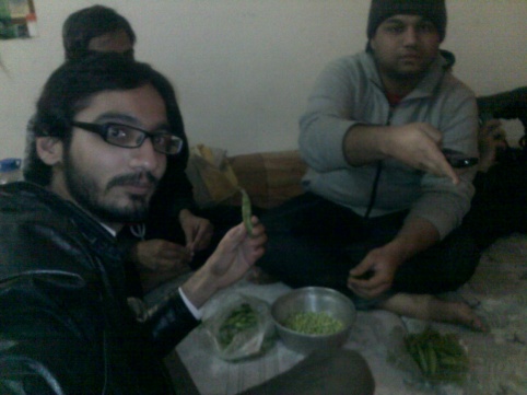 Qaiser preparing food for my Dawat... :)