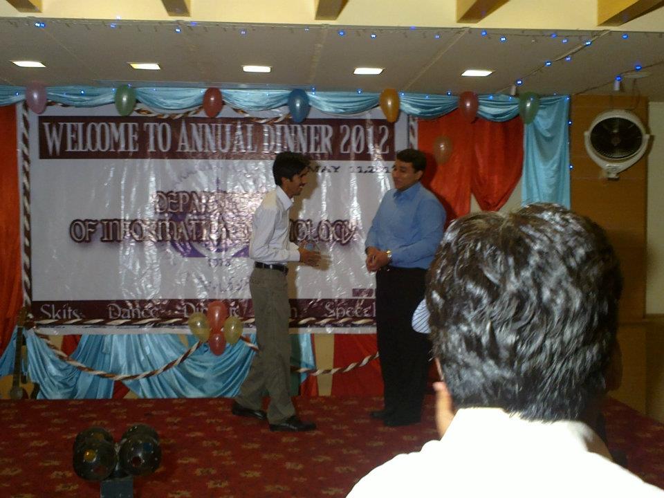 Maruf Pasha awarding shield to Ali Asad Sahu