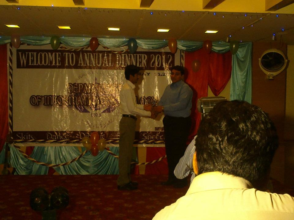 Sir Maruf awarding shield to Ali Asad Sahu