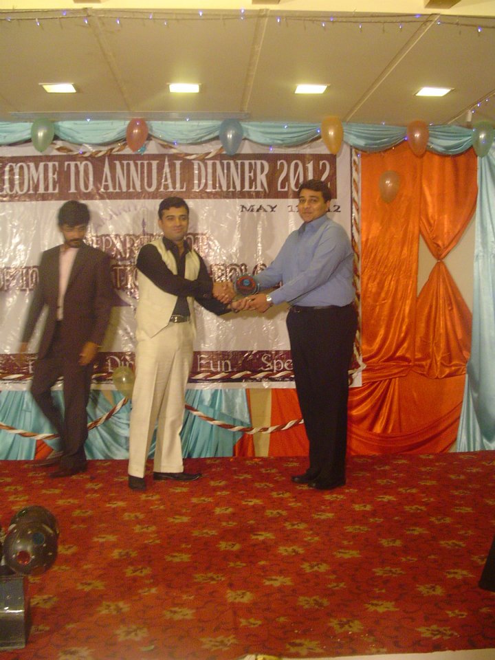 Hod Maruf Pasha giving shield to Sir Ahsan