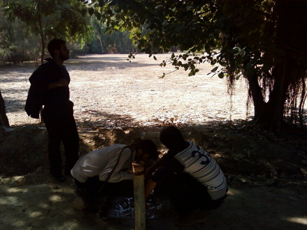 Aatif Drinking Water from the Hydrant